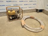 a machine that is sitting on the floor next to a hose