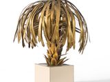 an image of a gold palm tree on a square base