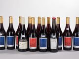 a group of bottles of wine sitting on top of a table