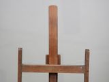 a wooden easel with a wooden handle on a white background