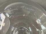 a close up of a glass of water on a table