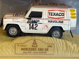 a toy truck that is on display in a case