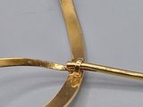 a pair of scissors that are laying on a table