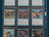 a lot of cards that are in a binder