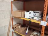 many boxes and boxes on the shelves in the room