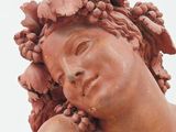 statue of a woman with flowers in her hair