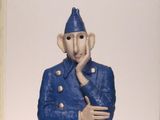 a book with a picture of a man in a blue jacket