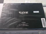 a laptop computer sitting on top of a stack of boxes