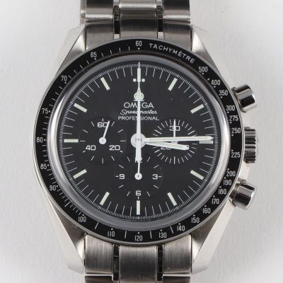 an image of a close up of a watch on a white surface