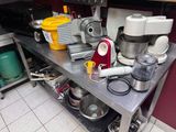 a table with a bunch of appliances on top of it