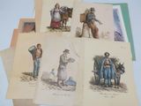 many cards with pictures of people on them on a table