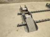 a picture of a pair of wheels attached to a metal frame