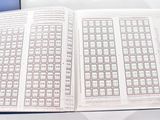 an open book that has a lot of numbers on it