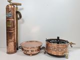 three different types of fire extinguisors on a table