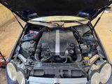 the engine of a car with its hood open and the hood open