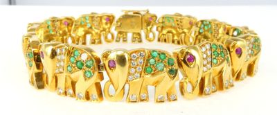 bracelet en forme d'éléphant plaqué or, orné d'émeraudes et de pierres roses