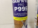 two cans of foam filler and a can of foam filler next to each other