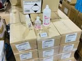 a pile of boxes with a lot of items on top of them