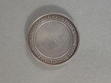 a close up of a coin on a table