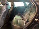 the back seats of a car are empty and the passenger seat is empty