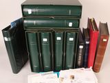 a lot of books that are stacked on top of each other