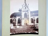 an old photo of a church with a clock tower in the middle of it