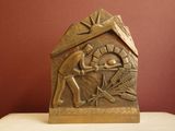a statue of a man and woman in a manger