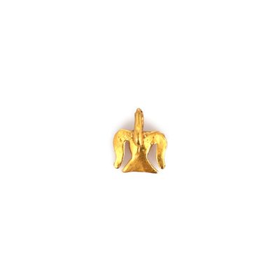 a close up of a gold plated horse head on a white background