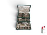 a green case with silverware in it on a white surface
