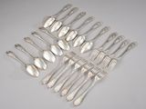 six silverplated spoons and six silverplated spoons on a white surface