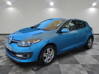 a blue car is parked in a room with a checkered floor