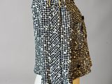 a black and white jacket on a mannequin mannequin mannequin mannequin mannequin mannequin mannequin mannequin mann