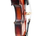 a violin that is being held up by a person