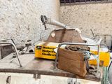 a small boat that is sitting in a garage