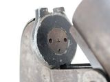 a close up of a metal object with a hole in it