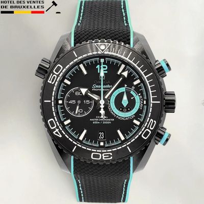 a close up of a wrist watch with a black and blue strap