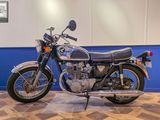 a motorcycle that is on display in a room