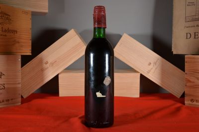 a bottle of wine that is sitting on a table