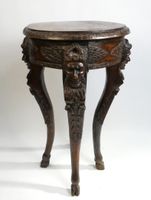 Sellette en bois foncé, posant sur 4 pieds, décor de mascaro… (photo 5)