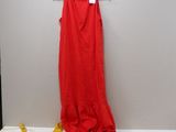 an image of a clothes rack with a red dress hanging on it