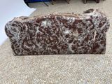 a couch that is sitting on the floor in a room