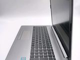 a laptop that is sitting on a white table