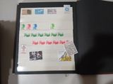 a picture of a folder with stamps on it