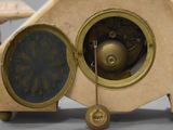 a clock that is sitting on top of a table