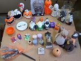 a table with a lot of halloween decorations on it