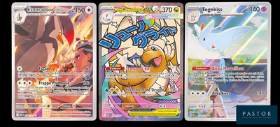 trois cartes Pokémon présentant des motifs différents sur un fond noir