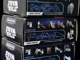 three boxes of star wars action figures are stacked on top of each other