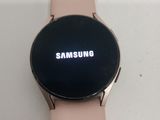a smart watch with the samsung logo displayed on the screen