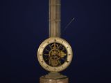 an old clock with a tower in the background on a dark blue background