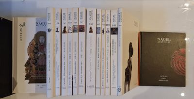 many books that are on a shelf in a book case